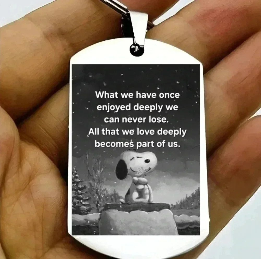 Snoopy in memory of someone we love quote keychain
